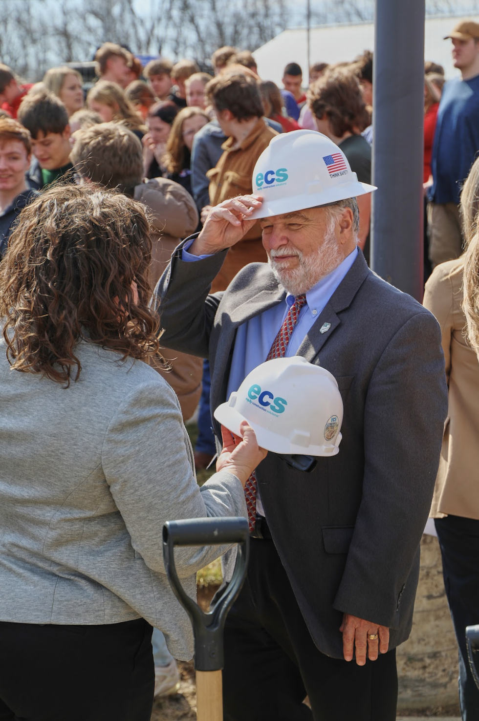 Civic leader receiving an ECS hard hat at the Fairfield STEM groundbreaking