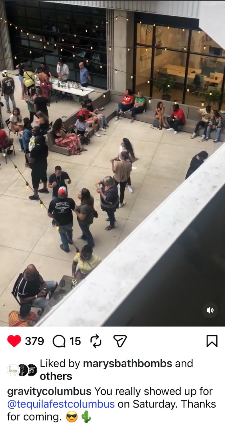 Instagram video still of Tequila Fest crowd on the Gravity terrace with string lights